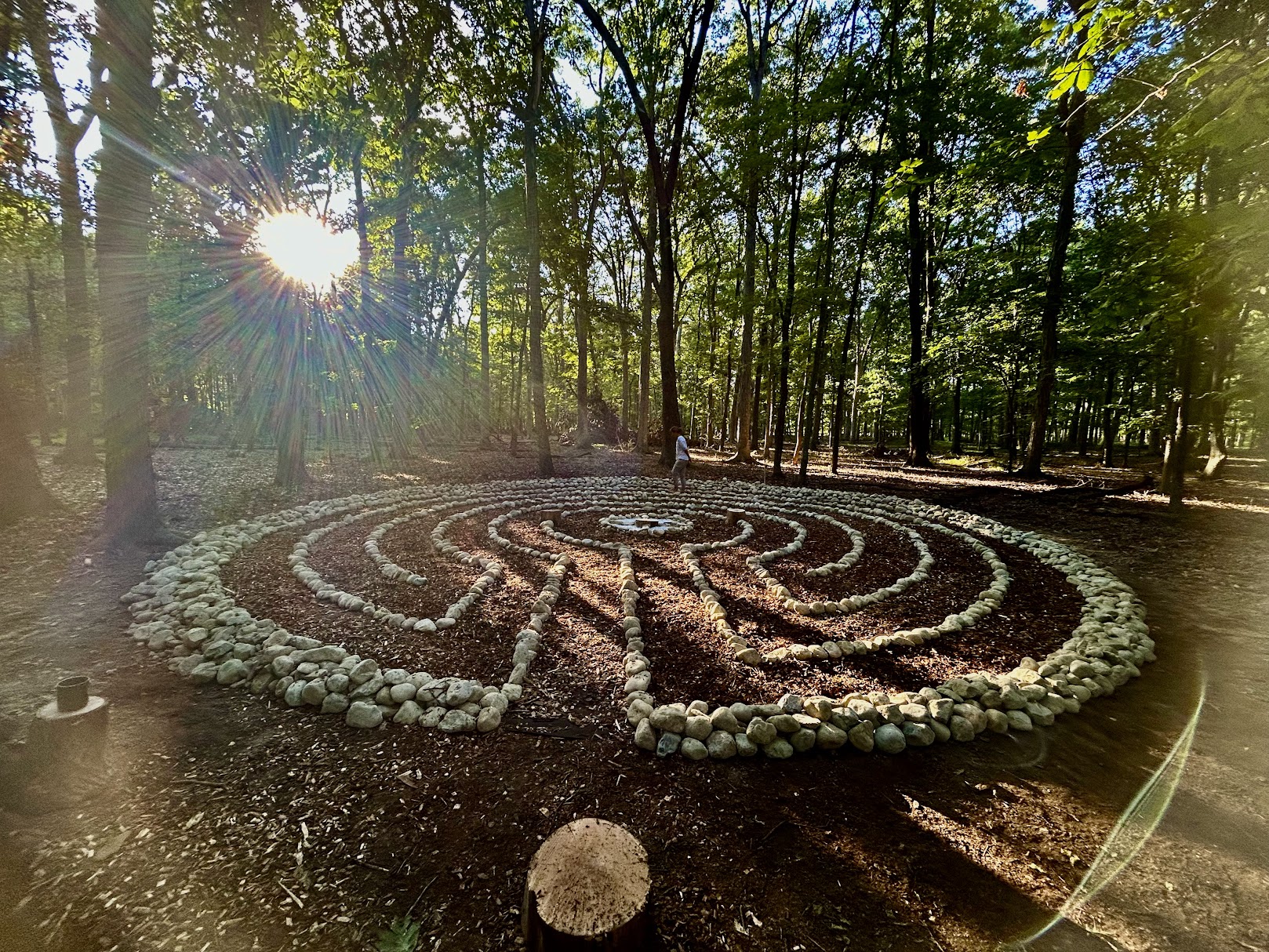 Aerial view of a finished stone labyrinth at dusk